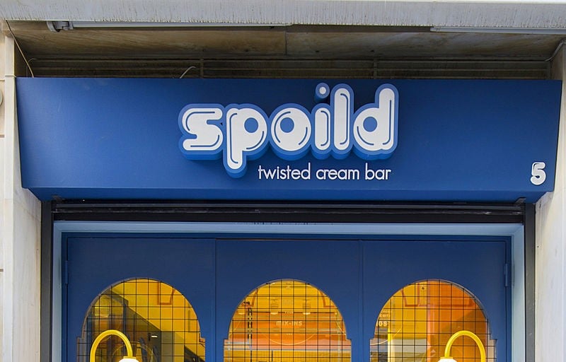 3D built logo sign welcomes visitors to the shop